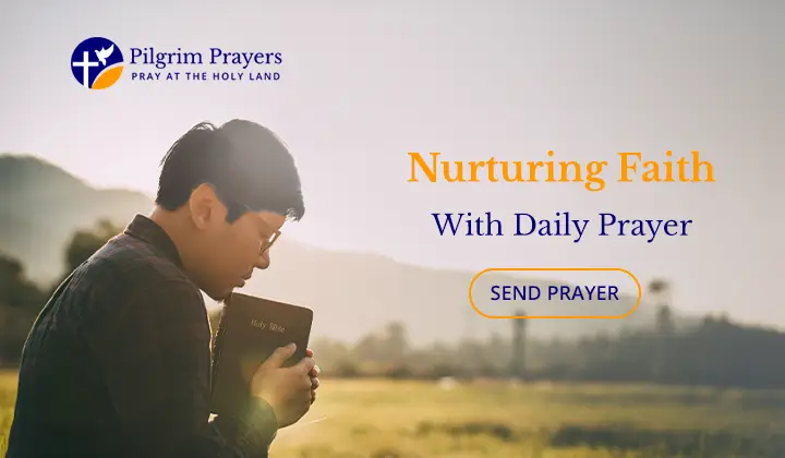 A person holding a prayer journal and clasping hands in devotion, symbolizing daily prayer practices.