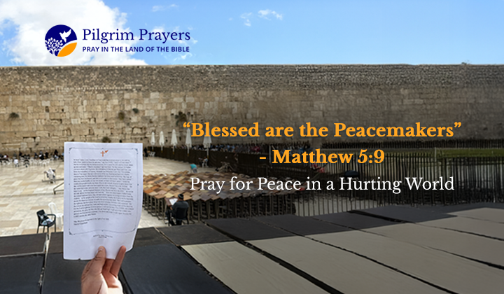 Western Wall in Jerusalem with prayer notes tucked between stones, symbolizing hope, faith, and the call to peace.