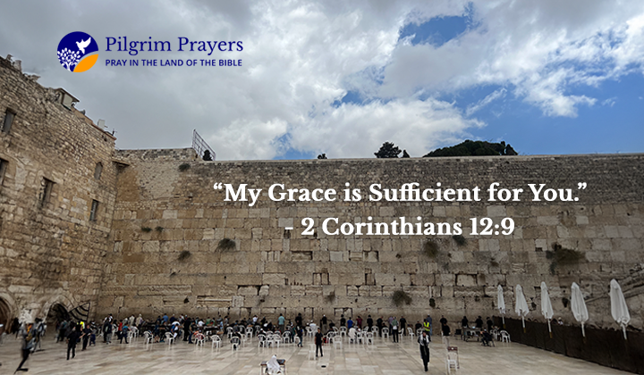 Bible verse from 2 Corinthians 12:9 with a peaceful view of the Western Wall in Jerusalem, symbolizing prayer and strength in weakness.