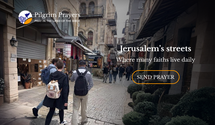 People walking through a busy street in Jerusalem’s Old City, with stone buildings, small shops, and cafés reflecting daily life returning after conflict.