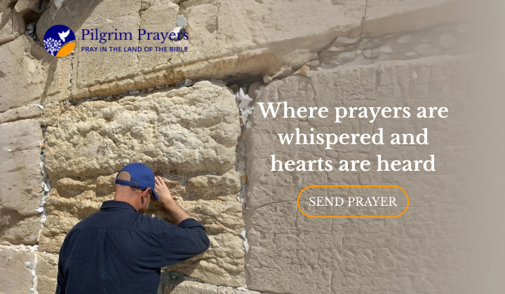 Uri praying at the stones of the Western Wall in Jerusalem, a sacred place of prayer for Jews and Christians
