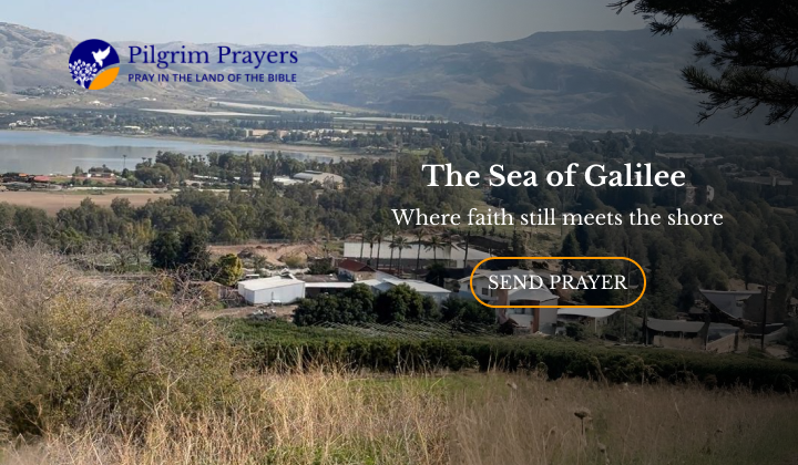 Golden sunset over the Sea of Galilee with calm water and surrounding hills in northern Israel.
