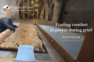 person praying quietly during grief, seeking comfort through prayers for grief and loss