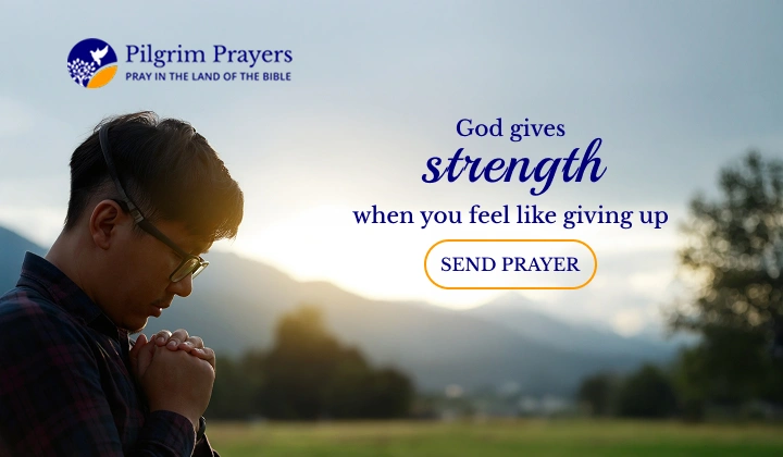 Person praying quietly for strength and hope during a difficult season