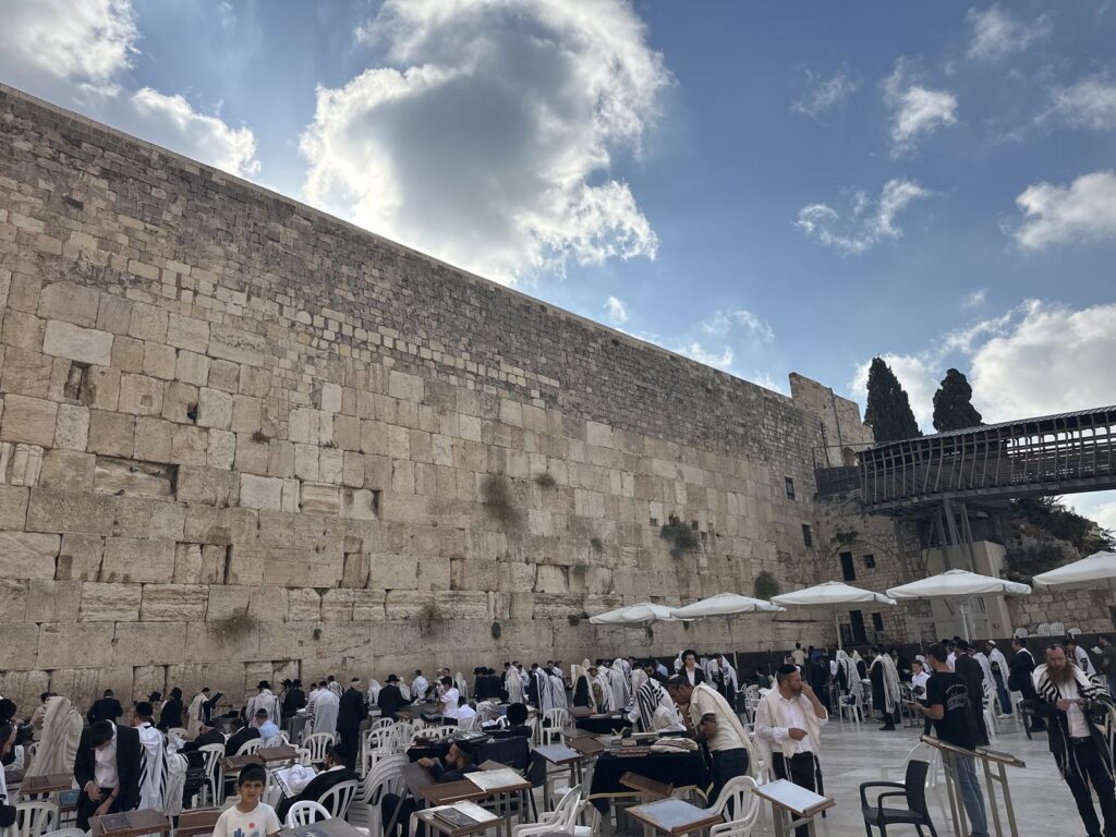 Worshippers at the Western Wall at eight in the morning