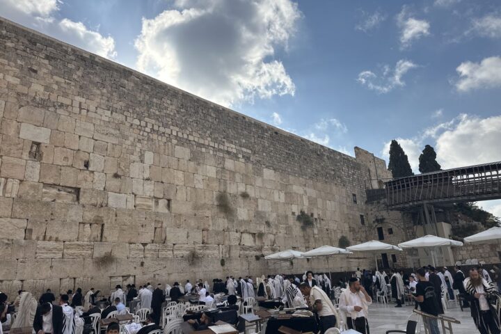 Worshippers at the Western Wall at eight in the morning
