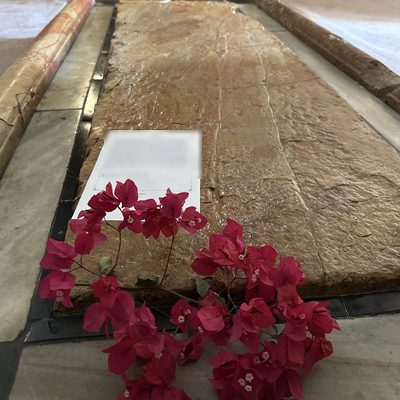 A printed prayer laid on the Stone of Unction in the Church of the Holy Sepulchre